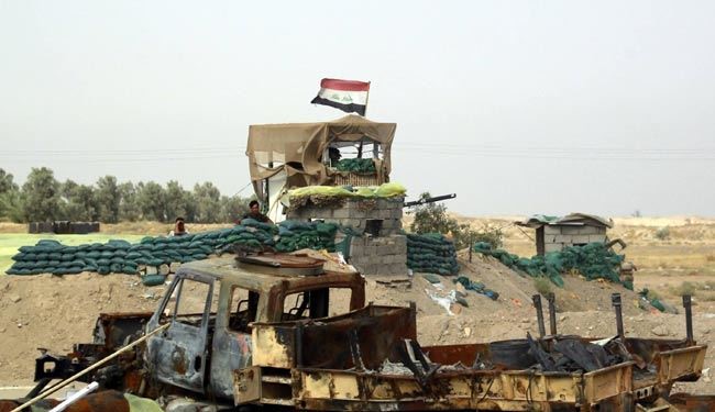 برافراشته شدن پرچم عراق در فرمانداری هیت
