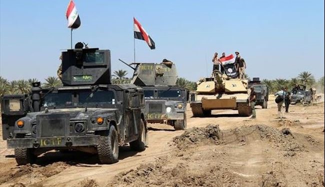 Iraqi Forces Take Full Control over Heet Town and Rais the Iraqi Flag