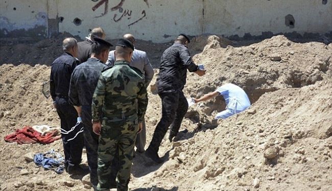 PICS: Iraqi Police Finds Two Mass Graves in Ramadi Soccer Stadium
