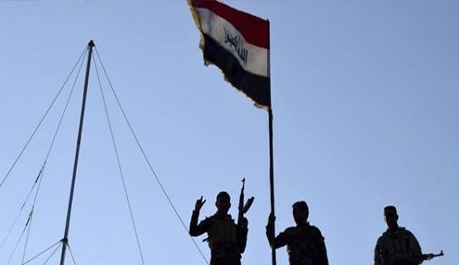 رفع علم العراق فوق المركز الصحي للجولان شمالي الفلوجة