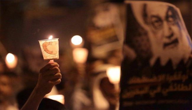 بزرگداشت شهدای الکراده با شمعهای روشن دربحرین