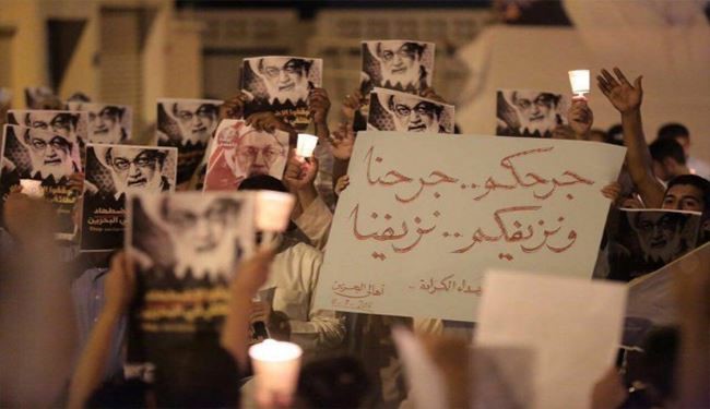 الآلاف يشعلون الشموع في البحرين حزنا على شهداء الكرادة +صور