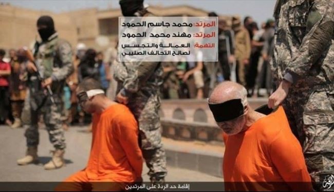 ISIS Beheads 2 Raqqa Civilians in Public Accusing Them as US Spies