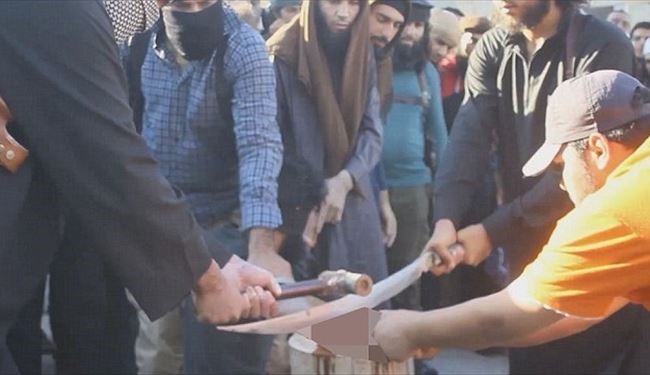 PHOTOS: Horrific Moment ISIS Chops off Thief Hand by Sword in front of Crowd in Syria