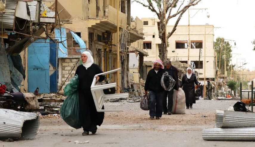 Syrian Civilians Leave Palmyra City after ISIS Return