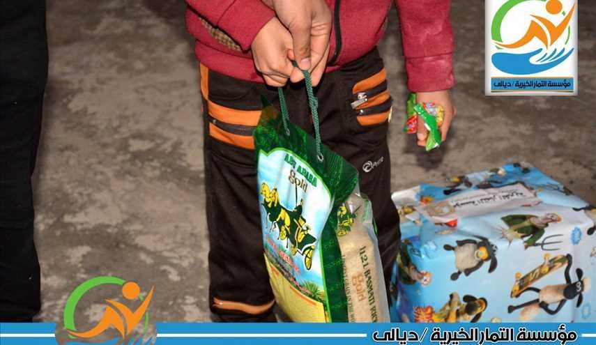 بالصور ..تقديم الدعم المالي والمساعدات لعائلات شهداء قوات الحشد الشعبي العراقي