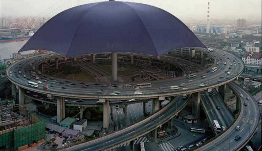 بالصور...أكبر مظلّة في العالم فوق جسر نابو بشنغهاي في الصين