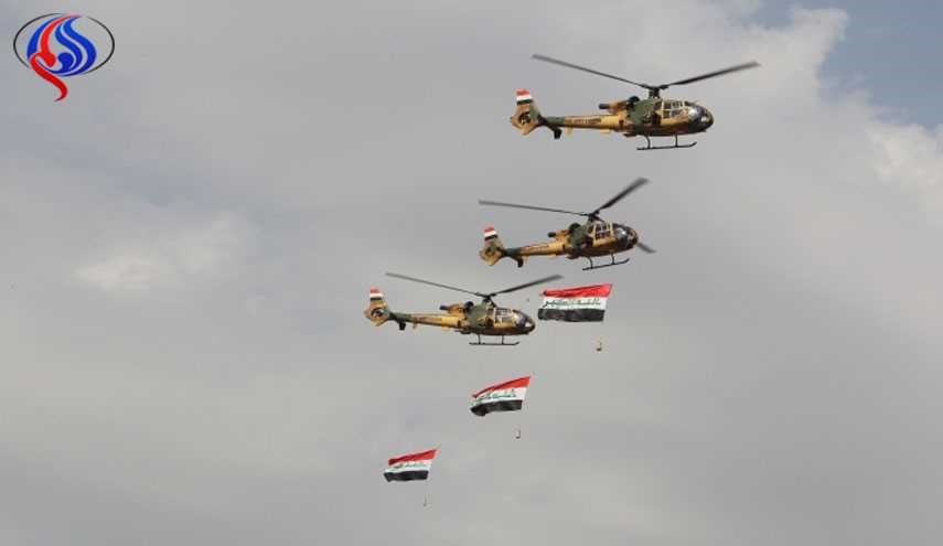 بالصور/ القوة الجوية العراقية تلقي منشورات على أيمن الموصل، ماذا فيها؟