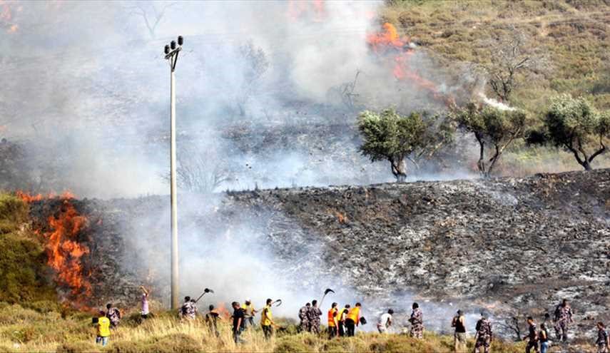 مستوطنون يضرمون النار بالمحاصيل الزراعية جنوب نابلس