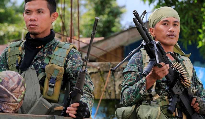 ISIS-linked militants storm school and take hostages in Philippines