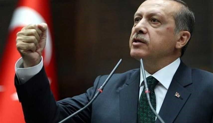 Turkey puts on trial 17 staff from anti-Erdogan daily
