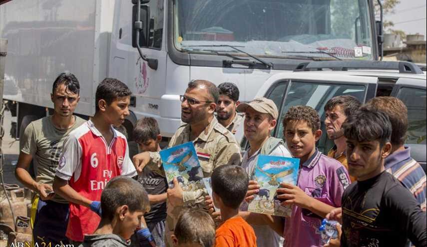 العتبة العباسية المقدسة تقدم هدايا لاطفال نازحين من الموصل