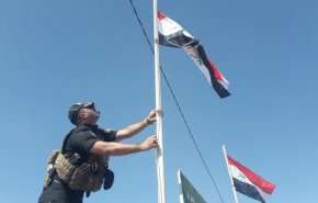 بالصور .. العلم العراقي يرفرف في سماء خانقين