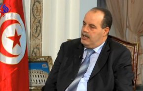 تونس.. وزير الداخلية السابق ينفي صدور بطاقة إيداع بالسجن في حقه