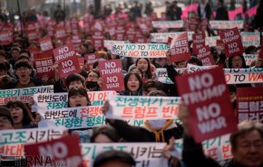 کره جنوبی / ادامه اعتراضات مردمی علیه سفر ترامپ به سئول + تصاویر