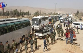 حافلات تبدأ بإخراج المسلحين من 3 بلدات جنوب دمشق