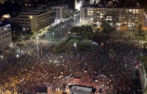 تظاهرات هزاران نفری در تل‌آویو و اعتراض به خشونت علیه زنان + عکس
