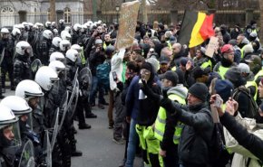 اشتباكات في بروكسل بين قوات الأمن والمحتجين على قانون الهجرة