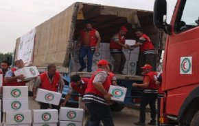 الهلال الاحمر السوري يرسل آلاف السلال الغذائية والاغاثية لمخيم الهول