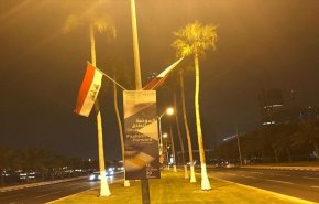 بالصور والفيديو.. الدوحة تتزين بالأعلام العراقية