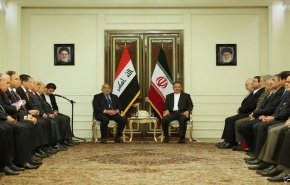 إيران والعراق مصممان على تطوير التعاون