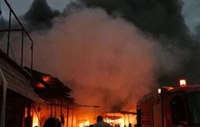 بالصور.. الدفاع المدني العراقي يسطر على حريق بفندق في كربلاء
