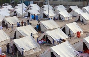 الهجرة العراقية تغلق مخيما للنازحين جنوبي الموصل