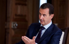 الأسد يحذر الامريكيين ويعلن موعد خروجهم