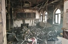 بالصور.. مدرسة في مجمع شهيد المحراب بالنجف تحترق بنار التخريب 