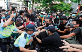 شرطة هونغ كونغ تحث المحتجين على السلمية قبل مسيرة ضخمة