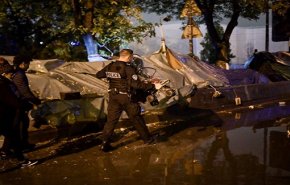 إجلاء مهاجرين من مخيم غير قانوني بشمالي باريس