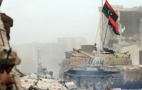 ليبيا... تجدد القتال في محيط طرابلس وإغلاق مطار معيتيقة