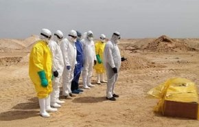 بالصور... هكذا يدفن المتوفون بكورونا في العراق
