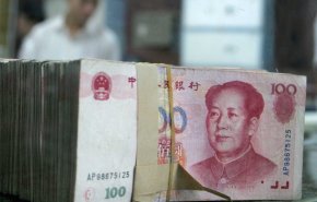 الصين تبدأ بتجربة عملة جديدة بدلا لنظام الدولار
