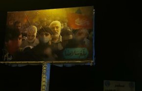 نصب پوسترهایی بزرگ از شهید سلیمانی و ابومهدی مهندس در عراق
