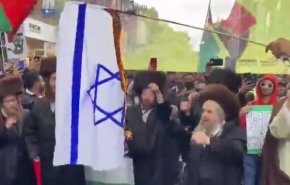 آتش زدن پرچم رژیم اسرائیل در پایتخت انگلیس به دست خاخام های یهودی 