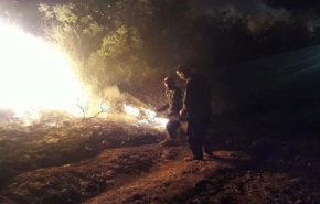 إخماد حريق على الحدود اللبنانية السورية بريف تلكلخ