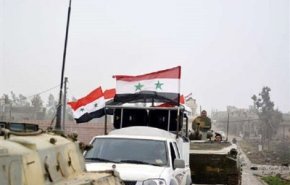 اهتزاز پرچم سوریه در "طفس" در حومه غربی درعا