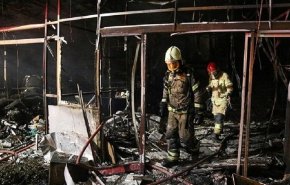 قتيلان باندلاع حريق في سوق بطهران