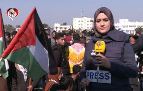 شاهد.. أهالي غزة يلبون نداء الارض بأعلام فلسطين 