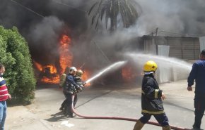 إخماد حريق بالكرادة في بغداد