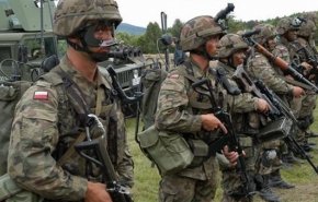 بولندا قد ترسل قوات إلى أوكرانيا تحت 'ضغط أميركي'