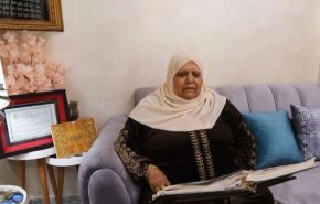 فلسطينية تتحدى السن تتم حفظ القرآن في سن الـ73