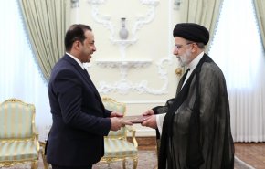  السفير الليبي في طهران يقدم أوراق أعتماده للرئيس الإيراني +صور