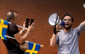فرد موهن به قرآن کریم در سوئد، مورد ضرب و شتم قرار گرفت+فیلم