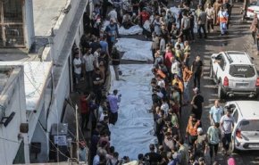 عشرات الشهداء يوارون الثرى بمقبرة جماعية في غزة