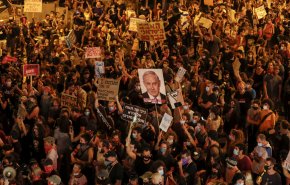 تظاهرات صهیونیست‌ها علیه کابینه نتانیاهو برای تسریع امضای طرح مبادله اسرا + فیلم