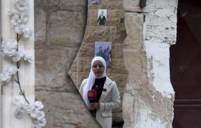 شاهد.. أسير فلسطيني يبتسم للشهادة في أحلك ساعات الظلام