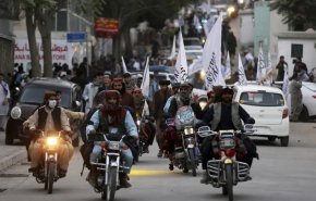 صور/احتفالات طالبان بذكراها على السلطة مع براميل صفراء!