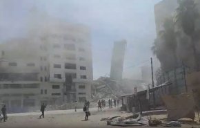 جنگنده های اسرائیلی برج مسکونی السوسی غزه را منهدم کردند+فیلم